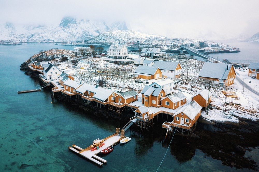 Aerial of a snowy fishing village, Norway