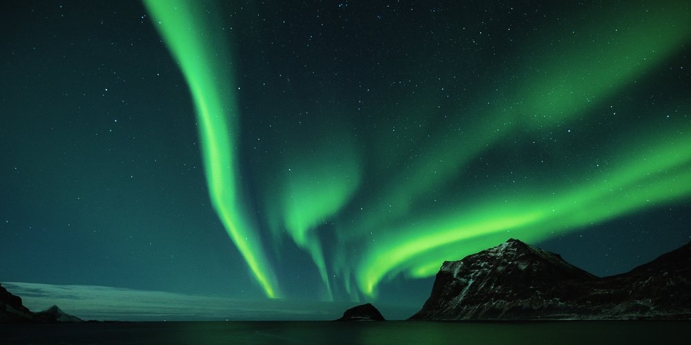 Northern lights over the mountains